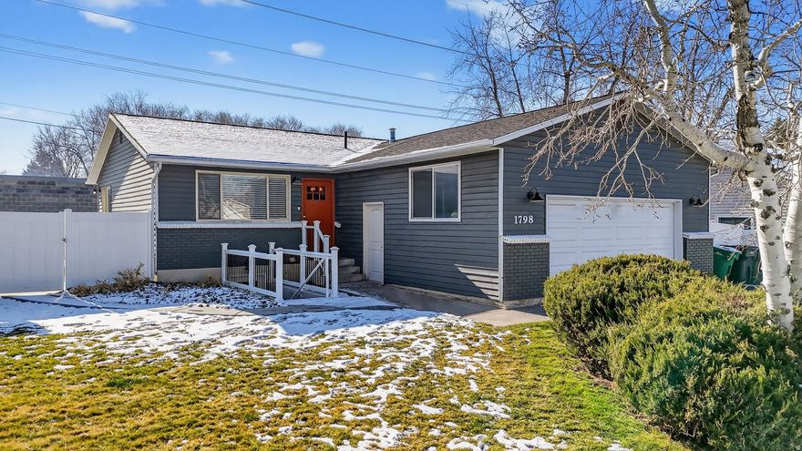 Step into this spacious and beautifully updated home in a highly desirable Sandy location. This home offers exceptional versatility featuring a separate entrance to the basement and a second kitchen, perfect for hosting guests, or potentially offsetting your mortgage! Inside you'll find light-filled living spaces and modern finishes. This is an unbeatable location with quick freeway access, and only 10-15 minutes to the Cottonwood Canyons providing easy access to hiking, biking, rock climbing, and world-class skiing! You are one minute away from the neighborhood Falcon Park, and minutes from Dimple Dell Regional Park. Plus, there are nearby shopping centers, dining, and the Salt Lake City International Airport only 30 minutes away.   Exterior highlights include a newly landscaped and fully fenced backyard, RV parking, and a new roof installed in 2022. This home has a rare combination of space, flexibility, and location. This home is a must-see!