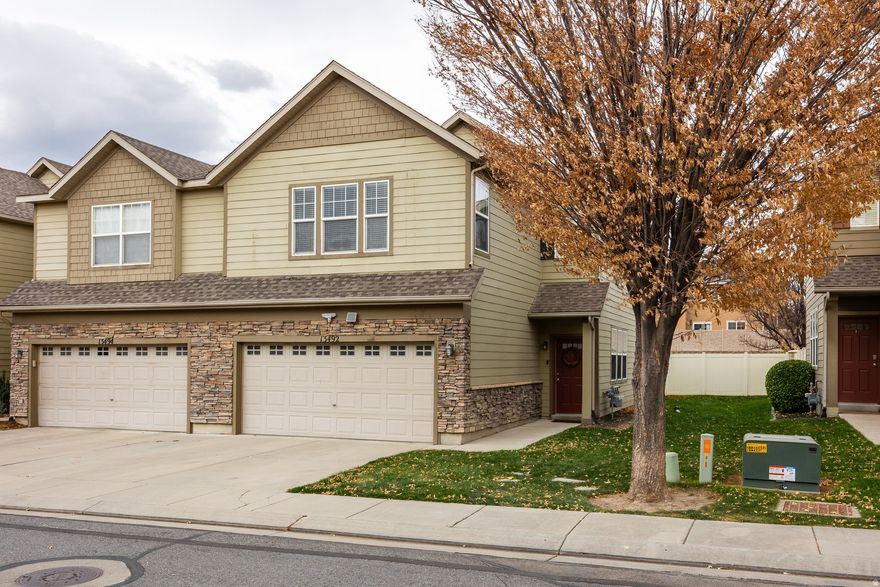 Beautifully updated and well-kept end unit townhome featuring granite countertops, LVP flooring, a new 2025 water heater, and included fridge. Master suite offers his-and-hers walk-in closets and a private bath. Enjoy a fenced patio and garage with hanging shelves. Google Fiber available. HOA includes a clubhouse with a gym and pool, snow removal, water, trash, and exterior insurance. Perfect move-in ready home!