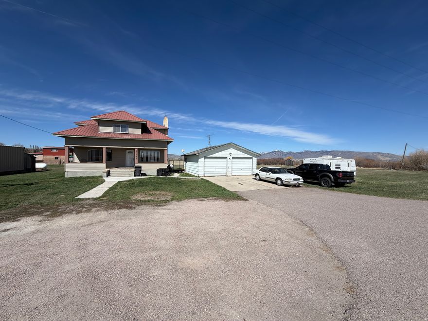 Incredible opportunity for country living at an affordable price tag! This 5 bedroom home is on nearly an acre and a half in Ovid for just under $300k, and that includes a detached 2 car garage and creek frontage on the east side with Ovid Creek - you don't ever have that kind of combination at this price! In addition, the sellers just barely had new siding professionally installed and are nearly done with new stucco on the foundation to modernize the full exterior look. Much of the interior is very modernized and updated, as well. The big living room/dining room combo is awesome! The bedrooms are large, and 3 of the 5 have big walk-in closets that are in the process of being drywalled and finished so it'll be ready to go for you and your family by closing. Don't miss out on this rare find!