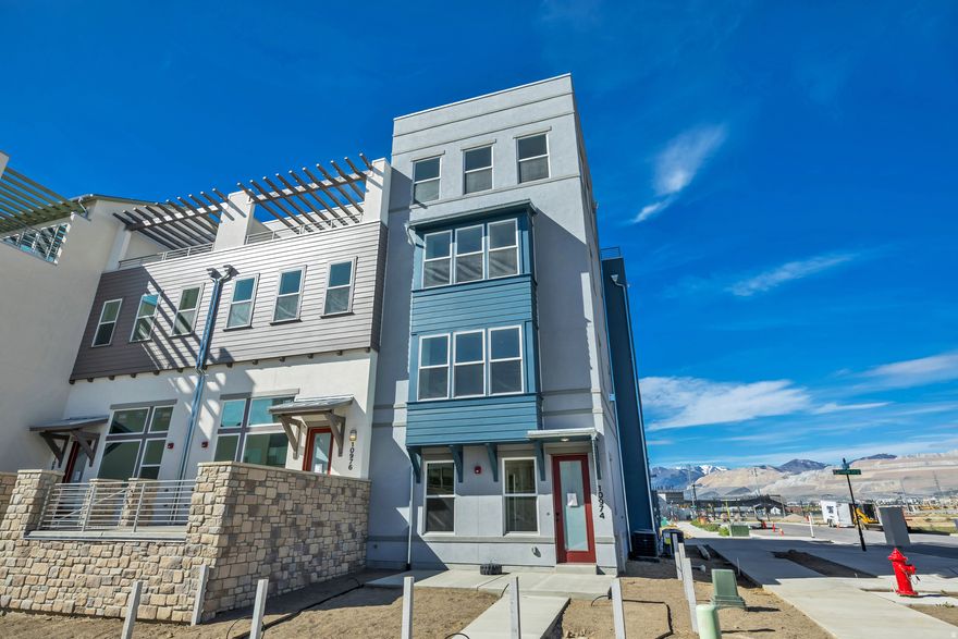 Living in Downtown Daybreak right near the Bees Stadium, Shops, Restaurants, & Year -Round Local Events! This home features our largest roof deck (hot tub ready!) allowing ample space for lounging, dining, or creating the perfect atmosphere to relax and enjoy. Featuring a large kitchen island and back patio. You'll have plenty of space to enjoy this home. Whether You're Hosting or just Hanging out, this Home Brings it all: Style, Space, and the Best Location in the City! ** Move in Ready!! **