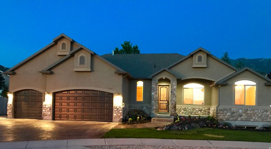 East Side Sandy 5 bedroom 4 bathroom Ranch style home.  New Carpet and paint.  Highly desired Lone Peak neighborhood, where streets are named after Snowbird ski runs. Highly desired open floor plan with 3 bedrooms on the main floor, flex room, great room with vaulted ceilings.  Flex room can be used as a formal living, dining or office.  Spacious Main Floor Primary Suite with walk-in closet, and bathroom with separate shower/jetted tub.  Gorgeous Knotty Alder Wood Package, 10 ft ceilings, alder doors (8ft tall) and trim finishes throughout give this home a timeless Deer Valley rustic flair.  Granite counters, travertine, SS appliances, double convection ovens, floor to ceiling stone gas fireplace, main floor laundry and mud room. Second bedroom suite with private bathroom in the basement, family room, extra storage room and coldstorage.  Watch the sunset and enjoy the view of city lights from the front porch.  Large 3 car garage and concrete pad for parking vehicles or toys.  Fenced back yard with patio, gas BBQ hookup.  Backyard has space for many possibilities:  sport court, pool or trampoline/play set, extra storage.  Prime location, quick and easy freeway access, a short walk to Storm Mountain Park, tennis courts, and bike/walk path trails.  Within Canyons School District and near many private schools including Waterford and Juan Diego.  Enjoy living minutes to 4 of Utah's great ski resorts, recreation hiking, biking, and adventure.  Buyer to verify all information. Buyer is advised to obtain an independent measurement.  Agent related to seller.  HOA fee is collected annually and is $225 for the whole year.  New carpet is a soft plush grey Life Proof/Pet Proof brand and matches throughout home.  Home is not currently furnished, photos with furniture are to give an idea of what the home looks like furnished.