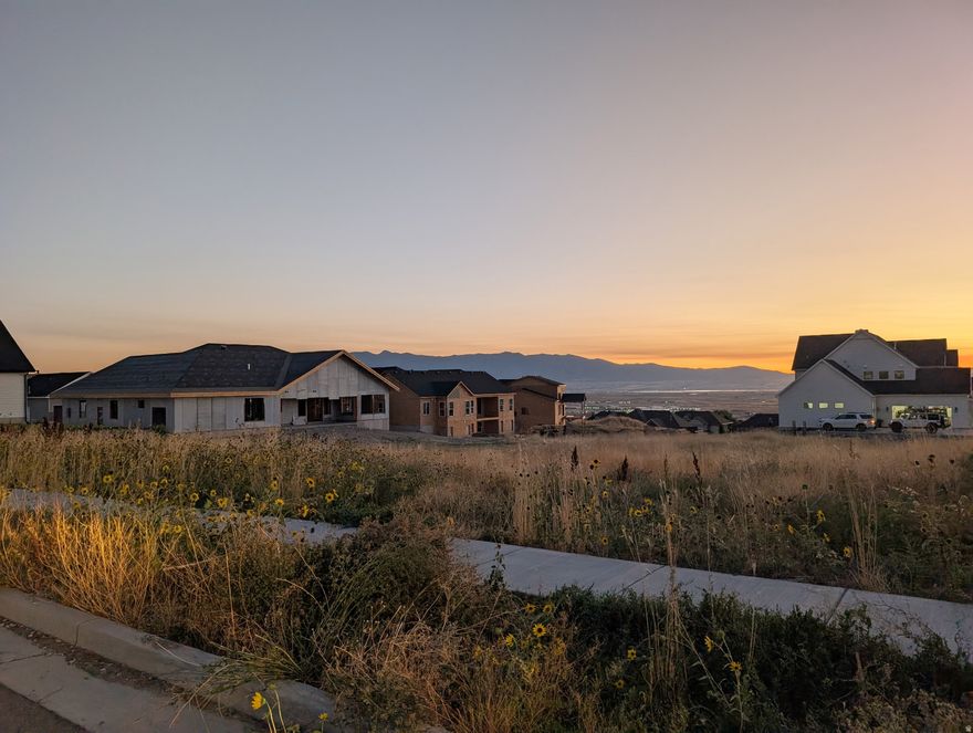 Great lot, perfect for your custom home with sunset views from a deck or walkout basement!  This large lot is perfectly situated on a corner so your new home can face either east or north.  The lot is both wide and deep with a gently natural slope.