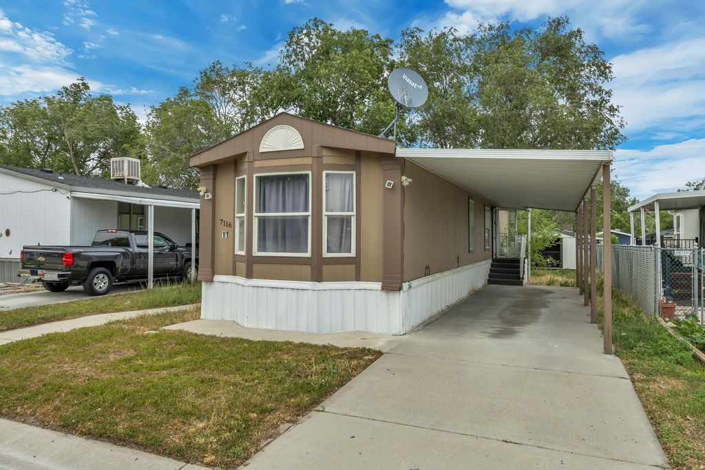 Photo of 7116 W BENDIXON DR S #11, West Valley City, UT 84128 (MLS # 2168695)