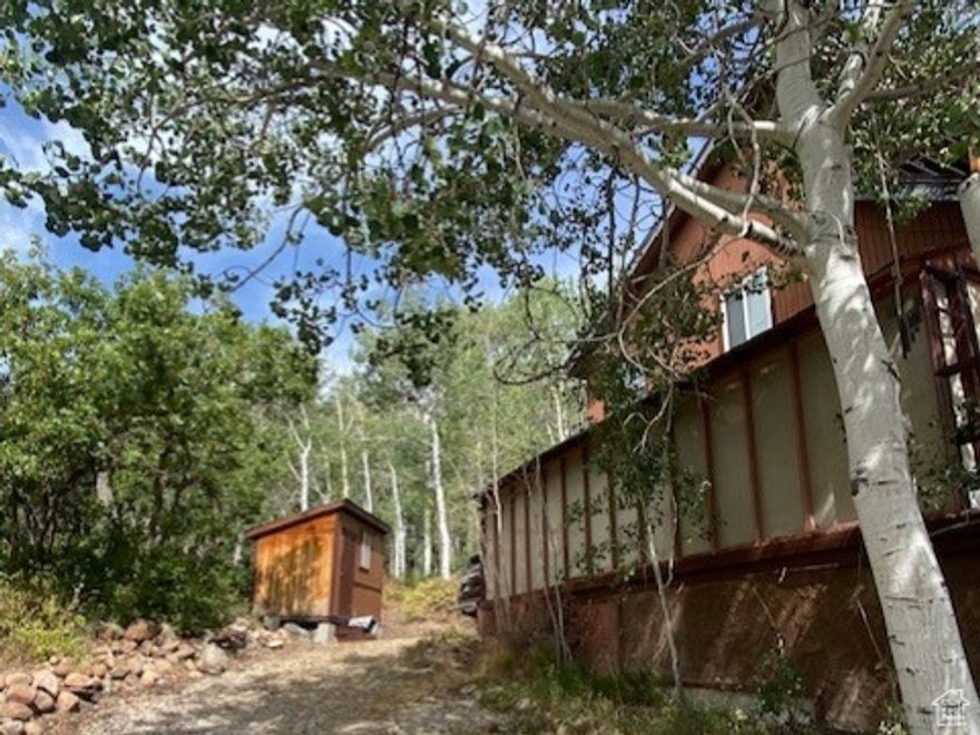 This charming four-bedroom cottage in Pine Meadow Ranch is ready for your personal touch and a lifetime of cherished memories. Nestled by the famous moose ponds on Elk Road, this home is at the center of all the wonderful amenities that mountain living has to offer. Enjoy abundant wildlife, cozy wood-burning fires, towering trees, fantastic neighbors, and the dream lifestyle you've always envisioned. Bring your tools, roll up your sleeves, and let the fun begin! Please note, this home is being sold as-is.