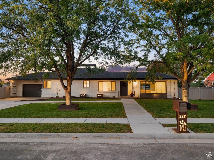 Welcome to this modern East Millcreek home. As you step inside, you'll immediately notice the inviting open-concept design, with large windows that flood the space with natural light and frame incredible views of Mount Olympus and the Wasatch Range. The main level features timeless finishes and a flexible layout, ideal for both daily living and entertaining. The open-concept living, kitchen, and dining areas include LVP flooring, professional-grade appliances, custom soft-close cabinetry, quartz countertops and backsplash, designer lighting, and an expansive island. The serene primary bedroom offers a spa-like en-suite bath with a European shower and dual sinks for a relaxing retreat. Main level laundry mud room, another spacious bedroom and full bath with a walk-out private patio complete the dreamy upstair space The full walkout lower level was designed to seamlessly flow with the rest of the home, but also offers flexibility as an ADU or mother-in-law apartment, or private guest suite. It includes a second kitchen, a spacious living area, a bedroom, a full bath, and a bonus optional air unit for temperature control. (The backyard was split to create two private yards for ADU, but the divider fence can easily be removed to create a full backyard space again) The professionally landscaped yard showcases modern steel accents, mature trees, and relaxing outdoor spaces. Custom outdoor lighting with backlit mailbox and planter boxes-crafted by a previous owner who was an artistic welder-add a unique touch. **The home was exceptionally remodeled in 2022, with major systems including electrical, plumbing, HVAC, water heater, windows, and landscaping all updated. A new roof, garage door, and patio were then added in 2025, ensuring long-term comfort and efficiency for years to come. Blending modern design with natural materials, this home offers both style and warmth. Located minutes from Millcreek & Parleys Canyons, downtown Salt Lake City, major freeways, and world-class ski resorts, this is one of the best locations in the valley. Don't miss the opportunity to own this dream home!
