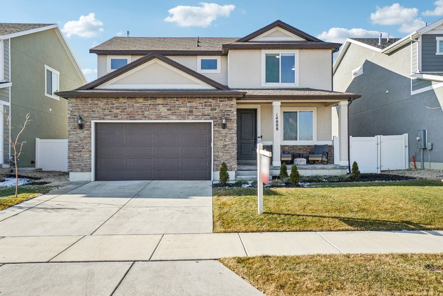 GRAND OPENING | OPEN HOUSE | JANUARY 17 | 11AM-2PM | Welcome home to this beautiful east Herriman 2-story with stunning views and no neighbors across the street, offering a rare sense of space and privacy. Tucked into a quiet neighborhood just minutes from Mountain View Village, you will enjoy convenient access to dining, shopping, Bangerter Highway, and Mountain View Corridor for an easy commute. The home features a well-designed floorplan with tasteful updates throughout the main level, including granite countertops, stainless steel appliances, and beautiful flooring. Upstairs, you will find a spacious loft and a large primary suite with an ensuite bath featuring dual vanities, a walk-in closet, and a separate tub and shower. Take in the views from the covered front porch and enjoy an immaculate, fully fenced backyard complete with a covered patio for relaxing or entertaining.