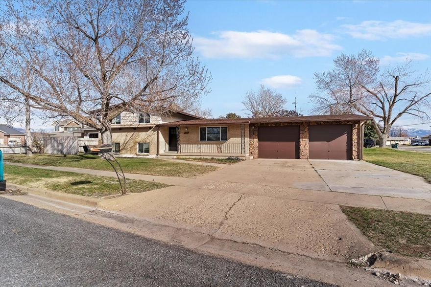 This fully renovated home is located in a cul-de-sac of a highly desirable neighborhood. It has everything you need, including a new roof, AC, furnace, windows, bathrooms, kitchen, flooring, and fresh paint, along with a walk-out basement entrance. The spacious back deck is perfect for entertaining, hosting BBQs, and enjoying summer evenings. A large 2-car garage provides plenty of storage and is big enough to accommodate larger vehicles. The covered front porch makes snowy days a little more bearable when it's time to shovel. The location is hard to beat, within walking distance of George Wahlen Park, which features an amazing playground, splash pad, pickleball courts, and more. The park neighbors North Park Elementary and the Weber County Library, creating an idyllic neighborhood setting. It is also conveniently located near FrontRunner, Hill Air Force Base, and other everyday amenities.