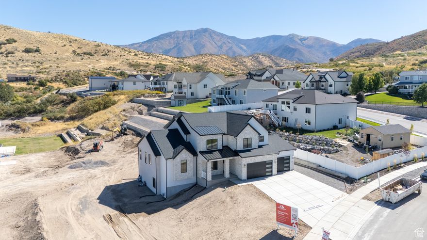 ** OPEN HOUSE SAT 9/27 from 2PM-4PM! $35,000 TOWARD CLOSING COSTS!! Come see all of our available homes**STOP THE SCROLL - this one checks all the boxes and will be finished around the end of summer!! Sitting on a massive .57 acre lot, you've got plenty of space to finally build that dream shop you've been talking about. The Kaitlyn floor plan gives you 5,200 sqft of wide open living space with views that are absolutely ridiculous - Payson Canyon, full valley, all right from your windows. Main level primary suite?  Private retreat, tons of space, and you don't have to climb a single stair. The vaulted ceilings and huge windows make the whole place feel light, bright, and open. The kitchen absolutely delivers - ceiling-height cabinets, top-end finishes, and plenty of room to host everything from Sunday dinner to the entire extended family. Downstairs you'll find a full walkout basement with its own entrance - perfect setup for a future ADU, rental, or whatever you want to turn it into. The oversized 3-car garage gives you all the room you need for toys, trucks, and tools - and there's still space left over. Partial landscaping is already done, but with over 1/2 of an acre, you've got endless options.  And if this one doesn't check every single box, we've got several other homes under construction - all with huge lots, insane views, and price points ranging from the high $800's to $1.3M. *Must use preferred lender and title company to get closing costs.