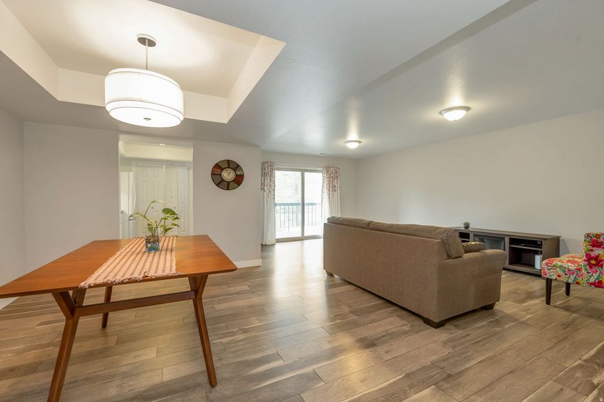 Located in the heart of Murray, this 2 bedroom 2 bath condo is clean, updated and move-in ready.  Both bedrooms have ensuite baths and walk-in closets. Bright, open floor plan. Newer windows, doors and HVAC. water softener and all appliances included. Plenty of storage in the laundry/utility room and garage. Large trees surrounding the property offer color, privacy, and shade. Enjoy  summer lounging by the community's in ground and fenced pool.  Schedule your showing today.