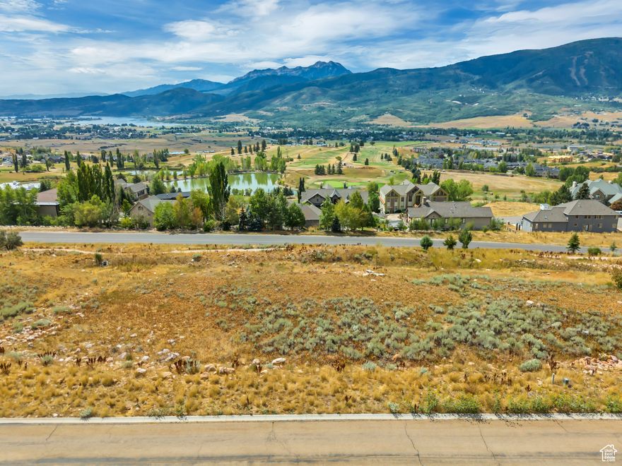 Dream Big in Eden's Exclusive Retreat Resort Community  Seize the opportunity to build your dream home on this exceptional lot in the heart of Eden, Utah. Located in a quiet cul-de-sac within the coveted Retreat Resort community, this gently sloping, buildable lot offers unobstructed panoramic views of the valley, Pineview Reservoir, and the majestic peaks of Snowbasin and Powder Mountain.  All the groundwork has been done for you-geological and house plans are completed, and water and connection fees are fully paid. With established utilities and affordable HOA dues, this property is ready for your mountain retreat or year-round residence.  Perfectly situated just 5 minutes from Wolf Creek Golf Course and close to world-class ski resorts, hiking, and trail networks, you'll enjoy the perfect blend of outdoor adventure and peaceful mountain living.  Don't miss this rare chance to create the lifestyle you've always envisioned amid Utah's pristine natural beauty.  **House Renderings and House Plans are located in Listing Documents.***