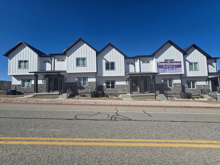 Fantastic location with mountain views. These gorgeous Townhome have an open floor plan lots of room! Located near snow basin" great skiing," schools, Weber University, Hill Air force base, parks, shopping, quick freeway access. Canned Lighting, Garage! 4th bedroom or private office. Could be a Live-Work space. Garage is prewired for an EV charger. Extra lighting Pkg. included. A Great Opportunity in South Weber! Grant monies available a $20,000 new construction grant " bond." to qualified buyers. Don't miss out on this 3-story! Square footage figures are provided as a courtesy estimate only and were obtained from architectural drawings. Buyer is advised to obtain an independent measurement. Please include proof of funds and pre-approval letter with all offers. Landscaping in common areas, Private road. HO6 Insurance policy required, policy's deductible of $25,000 on the exterior. Any Live-Work units must be approved through the city. seller incentives. Move in Fall of 2026.