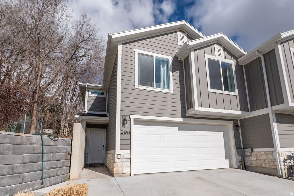 Photo of 598 PLUM LN, Ogden, UT 84404 (MLS # 2142080)