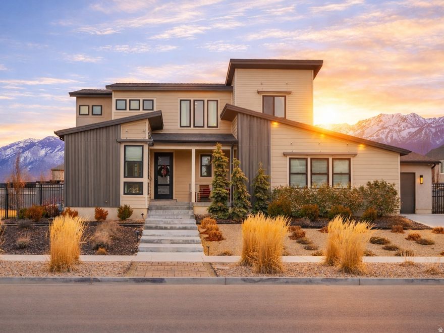 Upgraded former Model Home and Parade of Homes featured property in the desirable Big Willow Estates, which boasts easy highway access but provides a quiet neighborhood feel. Recent improvements include a finished 5th bedroom, fully enclosed cedar and wrought iron fence, upgraded primary suite aesthetic design, enhanced security system with full video monitoring and radon mitigation, and over $100,000 in exterior enhancements - all move-in ready. Main Floor: Offers an open living and dining area flowing into a custom kitchen with white oak cabinetry, oversized island, walk-in pantry, Cafe appliances, double ovens, double dishwashers, and tile flooring. A dedicated office/den and half bath complete the main level. Solid white oak hardwood floors and matching moldings throughout. Outdoors: West-facing lot that features custom designed hydro efficient landscaping, mature trees, shaded outdoor entertaining area with a custom water feature, gas fire pit, large revitalized garden boxes, and a full sprinkler system including an extensive high efficiency drip line network. Upstairs: Upgraded primary suite aesthetic design with ensuite bath, large shower, and walk-in closet; two additional bedrooms; loft; full bath; and laundry.  Basement: Majority-finished basement includes a large open family room, kitchenette, two bedrooms, and full bath, plus a spacious cold storage area and unfinished storage space for a potential 5th full bath and second laundry area. Extras: Oversized 3-car garage with EV charger, central air, gas heat with two furnaces and auto humidifier system, water softener system, and full landscape and exterior lighting. Family and pet friendly neighborhood recreation areas and Big Willow Creek Trail. Appliances and most furniture negotiable. Buyer/broker to verify all square footage from county records.