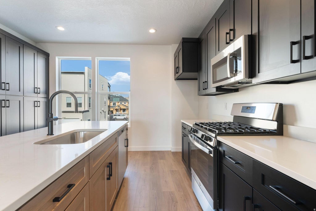 Photo of 7607 S NEW SYCAMORE DR W #430, West Jordan, UT 84081 (MLS # 2186308)