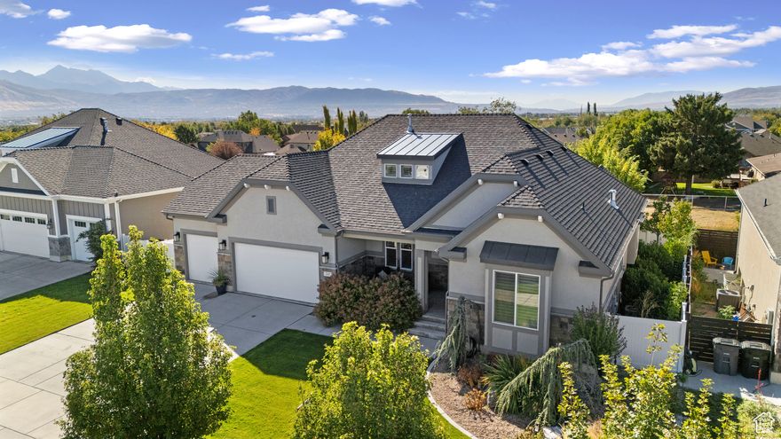 Welcome to this beautiful rambler located in the heart of highly sought-after South Jordan, UT. Nestled in a quiet and established neighborhood, this home offers charm, comfort, and plenty of opportunity. The unfinished basement provides incredible upside for expansion-perfect for creating additional living space and building equity. Inside, you'll find high-end finishes throughout, including quartz countertops in every room, even the laundry. The gourmet kitchen features double ovens, a built-in gas range with a sleek hood, and plenty of space for entertaining. Engineered hardwood floors flow through the main living areas, with tile in the bathrooms and plush carpet in the bedrooms. Step outside to your private backyard oasis complete with Trex decking, a cozy patio with a fire pit, and a gazebo offering shade for summer days. The professionally landscaped yard is beautifully manicured, creating the perfect retreat to relax or entertain. This home is a true gem!