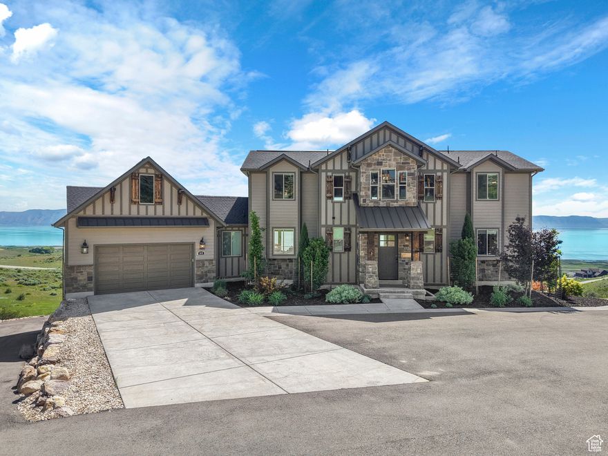 Welcome to 68 Hawksbeard Circle, a remarkable 8-bedroom, 5.5-bathroom estate located in the prestigious gated community of The Reserve at Bear Lake. Situated on .97 acre, this fully furnished, income-producing retreat comfortably sleeps up to 40 guests and offers breathtaking panoramic views of Bear Lake and the surrounding mountains. With spacious living areas, high-end finishes, and a proven track record as a successful Airbnb, this property is the ultimate blend of luxury, comfort, and investment potential. Designed for large gatherings and entertaining, the home features three fireplaces, an indoor playground and arcade, a private Bullfrog hot tub, fire pit, and multiple indoor and outdoor spaces to relax and reconnect. Behind the scenes, two tankless water heaters, dual A/C units and furnaces, and a buried 1,000-gallon propane tank ensure year-round efficiency and comfort. As part of The Reserve, homeowners enjoy exclusive access to private amenities including two resort-style pools, hot tubs, a splash pad, fitness center, clubhouse, sports courts, and a gated beach. Just minutes from ATV trails, snowmobiling, hiking, and boating, this location offers year-round adventure in one of Bear Lake's most coveted resort communities. This is more than just a home-it's a rare opportunity to own a luxury mountain-lake retreat with serious investment upside. Whether you're seeking a legacy property, vacation home, or short-term rental asset, this one delivers. Call the listing agent today to schedule your private tour.