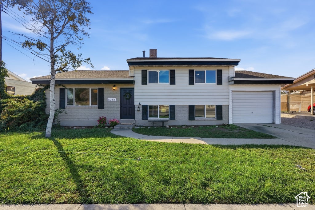 Photo of 6255 W 3500 S, West Valley City, UT 84128 (MLS # 2189697)