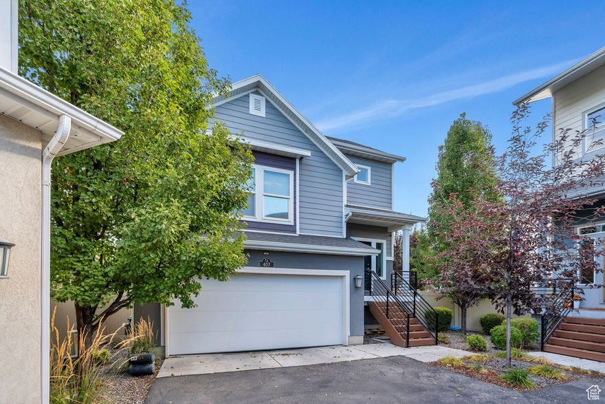 Beautiful two story home in American Fork. Open concept kitchen/dining room with quartz countertops and plenty of room for entertaining. Finished walk out basement makes a great multi purpose room. Large private fully fenced backyard with access gate to road parking. Great location! Close to I-15, restaurants, shopping and schools. THIS IS A MUST SEE! Buyer and Broker to verify sq footage.