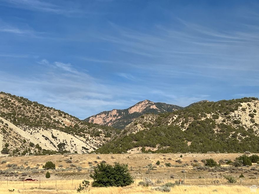 Great building lot with a gentle slope and great views of Nebo, the Red Cliffs and the valley. Ready to build on. Bring your builder or use ours.