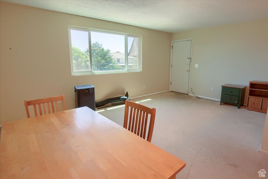 Top-Level Condo in Westglen Village  Great Location, Great Potential This well-maintained 1-bedroom, 1-bath top-floor condo in the Westglen Village community offers an excellent opportunity for homeownership or investment. Featuring updated kitchen finishes, included appliances, and plenty of natural light, this cozy unit is move-in ready and full of potential. Located near I-215, Valley Fair Mall, and the Maverik Center, you'll enjoy convenient access to shopping, dining, and transit.  The community offers a clubhouse, pool, spa, and playground, with HOA fees covering gas, water, and more. Covered parking and exterior storage included. This is a short sale and subject to third-party approval. Please contact the listing agent for more information or to schedule a showing.