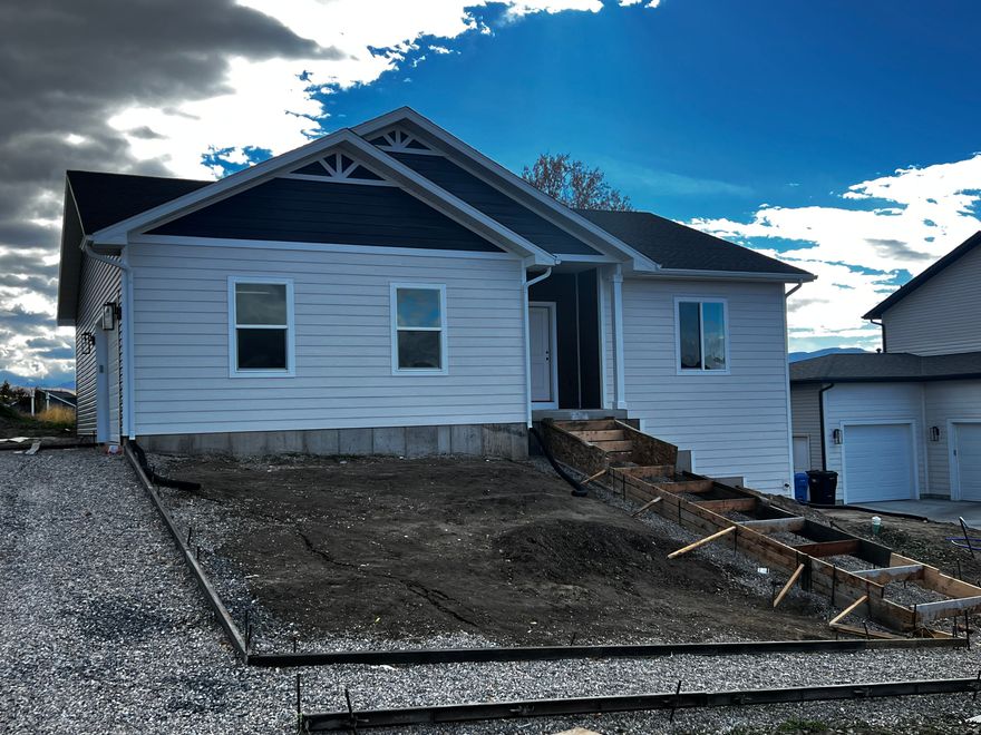 ASK HOW YOU CAN GET A 4.75% INTEREST RATE.  THIS IS A GREAT OPPORTUNITY!  BUILDER IS WILLING TO HELP WITH CLOSING COST! You will love this brand new home!  Currently under construction but the projected completion is  12/DEC/2025.  This inviting home features a spacious entry, open living area, and a modern kitchen with a large island and ample storage. Natural light floods the great room, which opens to a patio. Off the kitchen are a laundry room,  pantry, and storage closet. The home offers two bedrooms with a shared full bathroom, plus a primary suite that offers a walk-in closet and private bath. The Builder/Seller is including  Window Coverings, a Double Door Refrigerator, and a Washer and Dryer!  The popular Milton plan also features an unfinished basement, 2 car garage, and even a 10-year warranty all for under $500,000!  Pictures are of a home that has been built.  This home will have similar finishes and exterior.   Designed for comfort and entertaining, this home is ideal for creating memories. Ask for details!
