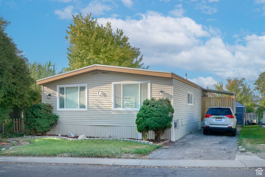 Elegant and move-in ready, this 3-bedroom, 2-bath manufactured home in Salt Lake City offers refined living on a well-sized 0.1-acre lot. Featuring a generously sized living room, a beautifully updated kitchen with modern finishes, and an airy, open-concept layout, this home combines comfort and style. Enjoy low-maintenance outdoor space, off-street parking, and a prime location close to schools, shopping, and commuter routes. Must have park approval prior to submitting offer.  Square footage figures are provided as a courtesy estimate only and were obtained from county records. Buyer is advised to obtain an independent measurement.