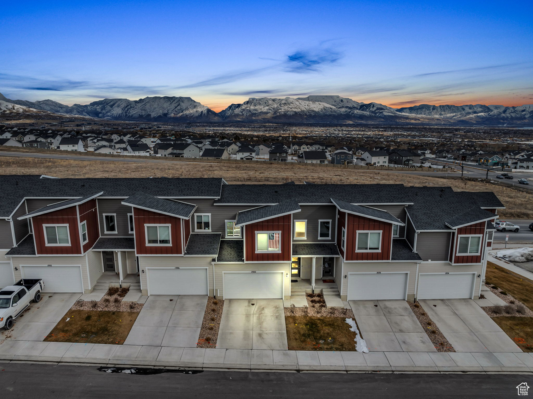 Welcome home to the sweetest deal you've been searching for! Perched in a secluded Saratoga Springs community, this stunning 2-story townhome offers breathtaking views of the Wasatch Mountains. Designed with tall ceilings, abundant natural light, and a spacious open-concept layout, it checks all the boxes-without stretching your budget! The main floor is perfect for both relaxation and entertaining, while the upstairs offers optimal livability. The thoughtfully designed kitchen features a large quartz island, oversized cabinets, and a seamless connection to the dining and family rooms. Upstairs, you'll find a spacious primary suite, two additional bedrooms, and well-appointed bathrooms. The home also includes a two-car garage and an unfinished walkout basement-ideal for extra storage or future expansion. Step outside to a private patio, perfect for unwinding after a long day. Don't miss this incredible opportunity-schedule your showing today!  Grand Open House on 2/22/2025 from 11am - 1pm.