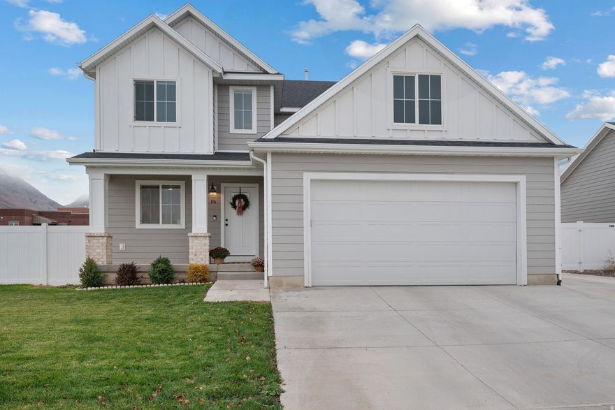 This nearly new, beautifully maintained property is ready for you to make it your own. The open-concept living area and entry room welcomes in natural light, throughout the main floor, creating a bright and spacious feel. The modern style kitchen is perfect for entertaining, not to mention the massive walk-in pantry.The main level has a half bath and access to the two car garage. Upstairs, you'll find four generously sized bedrooms and a guest bathroom.The primary suite features a spacious ensuite bathroom and a large walk-in closet. You'll also find a conveniently located laundry room on the second floor making chores a breeze. The unfinished basement offers endless possibilities and potential to grow. Whether you want to finish it or leave it as a flexible space, it's a blank canvas waiting for your personal touch. With this prime location you'll get a small neighborhood feel, being within walking distance of a great elementary school, no backyard neighbors, fully finished/fenced yard, breathtaking views of the east side mountains and minutes from I-15, making your daily commute a breeze, this home has it all! Don't miss out on this opportunity!