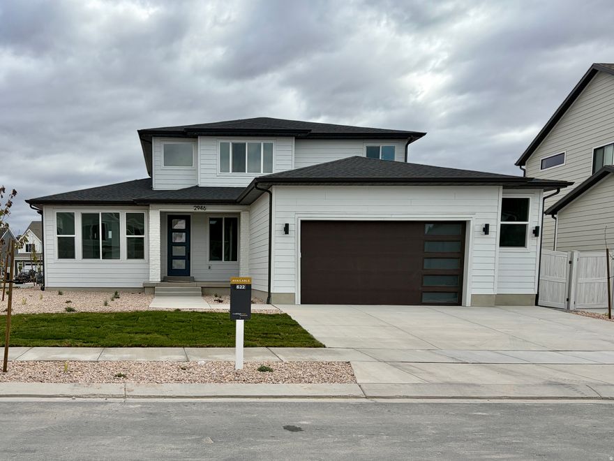 The Durango is a stunning two-story floor plan featuring four bedrooms and two-and-a-half bathrooms. The main floor includes a formal living room or office off the entryway, a primary suite with a massive walk-in closet, and convenient spaces like a mudroom, powder bath, and pantry near the garage. The great room impresses with two-story ceilings and abundant natural light. Upstairs, three bedrooms share a full bathroom, with a nearby laundry room for added convenience, making the Durango an ideal layout for families. This home is located in Firefly, the master-planned community built specifically for kids to live life unplugged. Stop fighting over screen time and start reconnecting in an environment engineered to encourage play. Firefly isn't just a neighborhood, it's a 350+ acre network of parks, trails, and amenities designed to inspire adventure and activity. The day you move in, your kids will be enjoying the skate and wheels park, the bike pump track, the downhill mountain bike course, pickleball and basketball courts, neighborhood playgrounds, and miles of trails. Is your child shy? Firefly has the region's only full-time Activities Director curating weekly activities and events for all ages, encouraging families and neighbors to connect in nature. Located in Eagle Mountain, Firefly is an easy commute to the Silicon Slopes, with close proximity to shopping and entertainment. Just 40 miles south of Salt Lake City and 30 miles north of Provo, it's one of Utah County's fastest-growing cities. Book a tour of this beautiful Candlelight home, explore all the amenities, and see for yourself why Firefly is the best place in Utah to raise your kids.