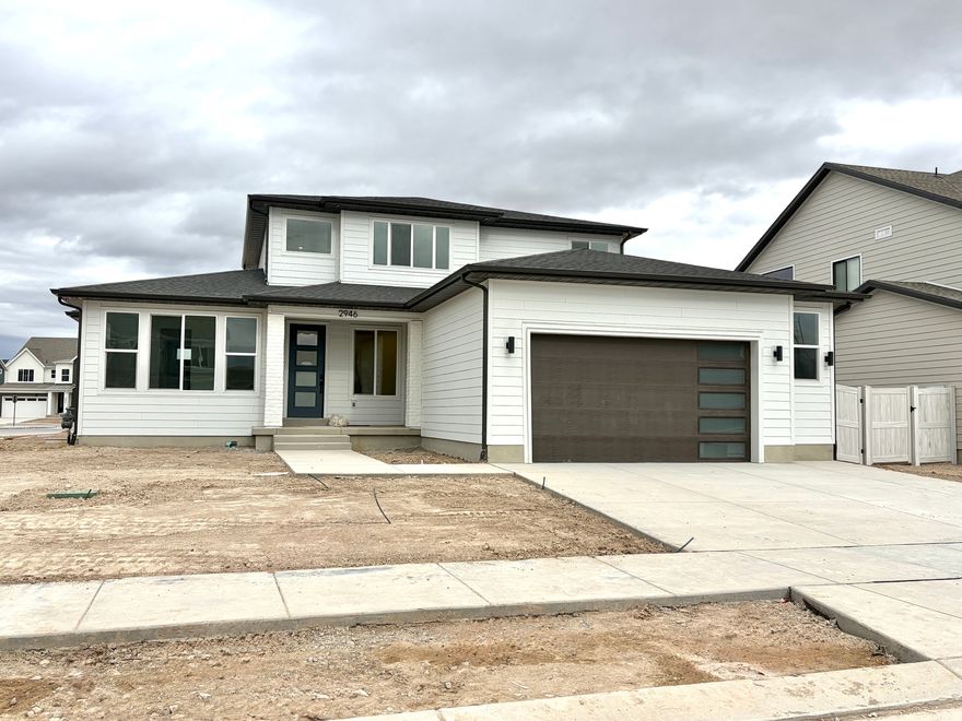 The Durango is a two-story floor plan with four bedrooms and two-and-a-half bathrooms. The main floor includes a formal living room or office, a primary en suite with vaulted ceilings and a large walk-in closet, and a mudroom, powder bath, and pantry off the garage entry for convenience. Upstairs, three bedrooms share a full bath, an adjacent laundry room, and a large loft space. This home is located in Firefly, the master-planned community built specifically for kids to live life unplugged. Stop fighting over screen time and start reconnecting in an environment engineered to encourage play. Firefly isn't just a neighborhood, it's a 350+ acre network of parks, trails, and amenities designed to inspire adventure and activity. The day you move in, your kids will be enjoying the skate and wheels park, the bike pump track, the downhill mountain bike course, pickleball and basketball courts, neighborhood playgrounds, and miles of trails. Is your child shy? Firefly has the region's only full-time Activities Director curating weekly activities and events for all ages, encouraging families and neighbors to connect in nature. Located in Eagle Mountain, Firefly is an easy commute to the Silicon Slopes, with close proximity to shopping and entertainment. Just 40 miles south of Salt Lake City and 30 miles north of Provo, it's one of Utah County's fastest-growing cities. Book a tour of this beautiful Candlelight home, explore all the amenities, and see for yourself why Firefly is the best place in Utah to raise your kids.