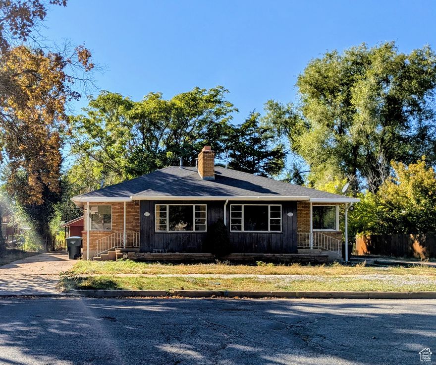 Great investment opportunity.  Triplex is being sold as is.  It is priced accordingly.  This Triplex has great potential It is has a 1 car garage & a work shop.  A carport as well. There is a storage shed in the the   back, The style is up and down.