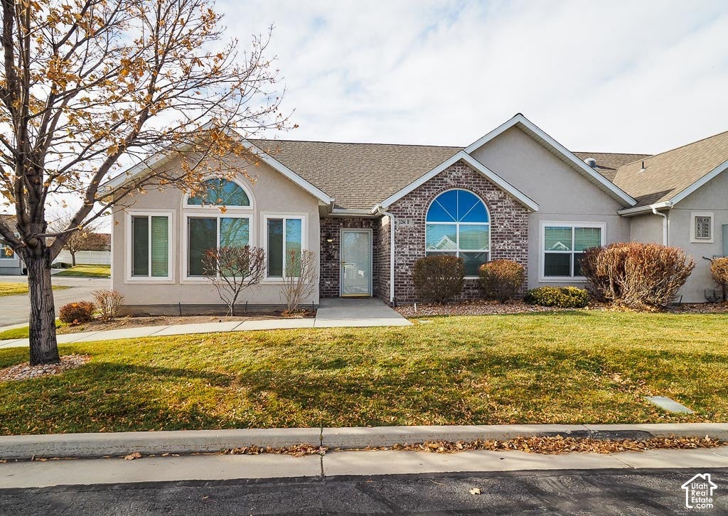 Photo of 3284 S HUNTER VILLA LN W #B, West Valley City, UT 84128 (MLS # 2188227)