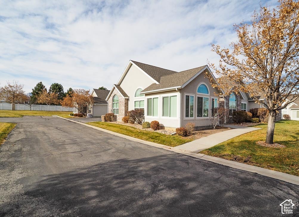 Photo of 3284 S HUNTER VILLA LN W #B, West Valley City, UT 84128 (MLS # 2188227)