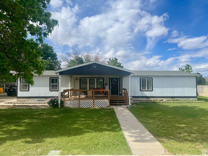 Spacious one-level living in this 4 Bdrm, 2 bath home on 1.89 acres! Huge 30' X 40' detached garage with workbench! Workbench and shelving in garage is included. Garage has 220 power, 2 welding receptacles, there are 7 shares of secondary water that is approximately $155/year that will be transferred at closing. There is an On Demand water heater that is on propane but is plumbed for natural gas. Buyer would just need to get a gas water heater. New water pump! 2 corrals, Lean-to, 1 acre of pasture, 6 inch gated pipe in the pasture. Tramp and swing set excluded.