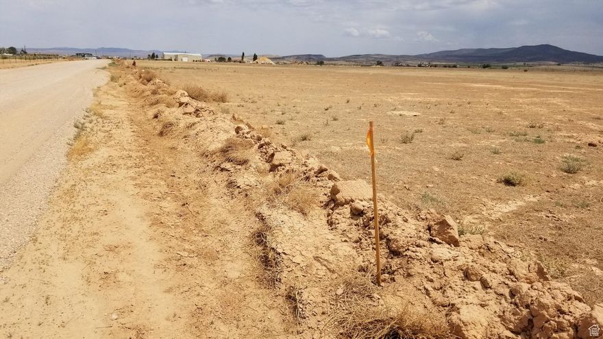 This 5.6 acres lot is zoned as Research and Industrial Park. It has three phase power, water and natural gas lines. Seller financing with 20% down 8%int 5yr. INTERACTIVE Map link: https://www.google.com/maps/d/edit?mid=1xSBNcNOOUmdmoOijTPq1caGiKcReZlc&ll=37.785856571059554%2C-113.04756253138466&z=18 PS... For the Cedar Valley, when it comes to ''the price is right'' you won't find a better deal than in this subdivision.