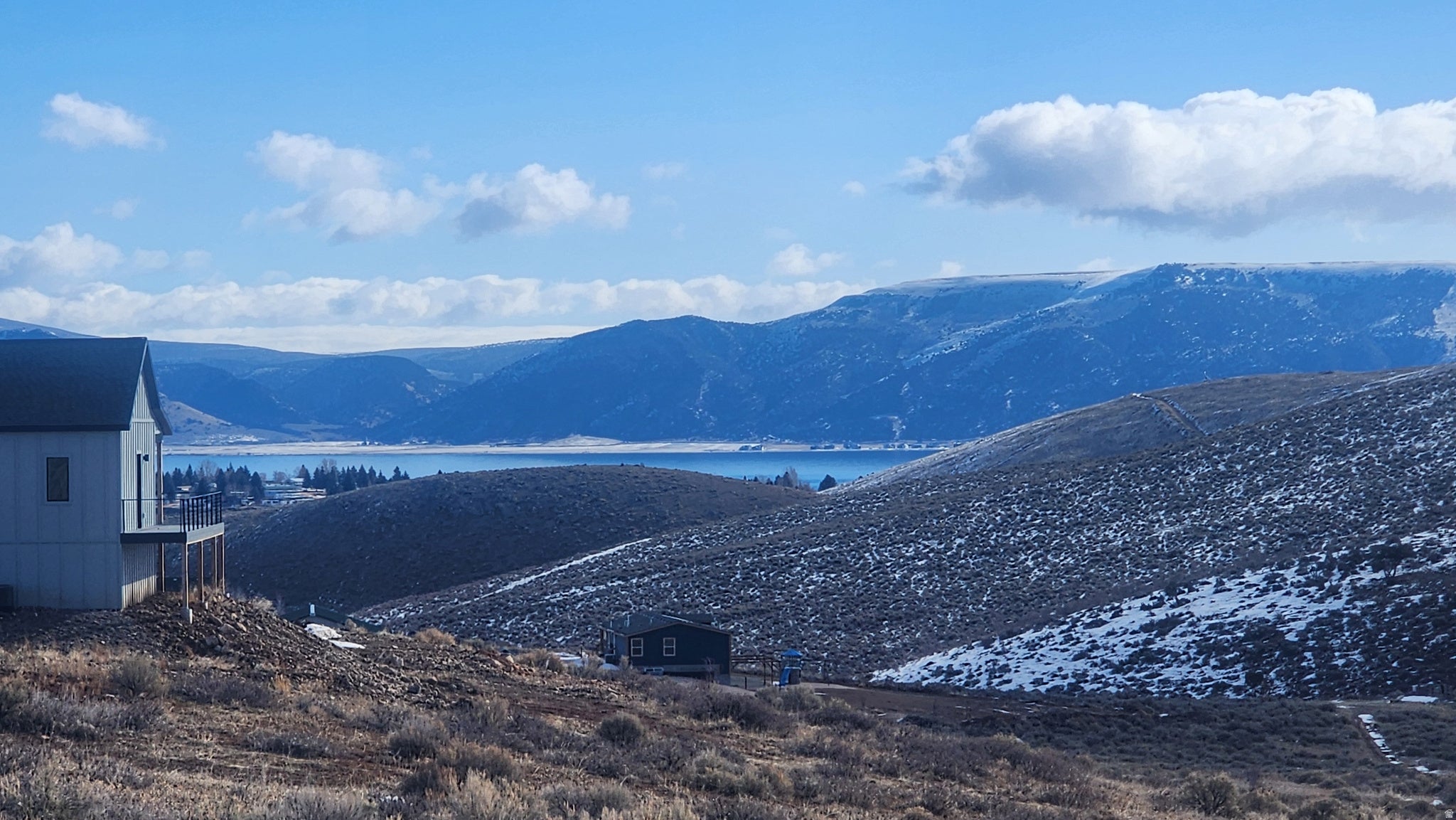 Mountain view featuring a nearby body of water