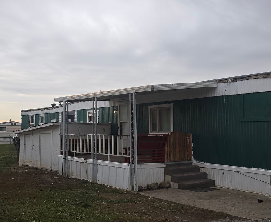 Fixer-Upper, Big Opportunity! 3 Bed 2 Bath Manufactured Home on a Corner Lot- Make It Your Dream Home at an Incredible Price! Square footage figures are provided as a courtesy estimate only and were obtained from County.  Buyer is advised to obtain an independent measurement.