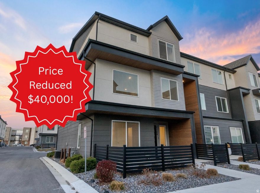 $40k price cut!This 4 bedroom 3 full bathroom luxury townhome in American Fork actually feels like a single family home. From the moment you walk inside, you get bright natural light, tall ceilings, and a modern open layout perfect for hosting. This end unit gives you extra windows, more privacy, and additional parking directly in front of the garage. The home is move in ready with a modern kitchen featuring quartz countertops, stainless steel gas appliances, a wide island, and a single basin farmhouse style sink that makes cooking and cleaning easier. The second level offers tall 9 foot ceilings! Upstairs you'll find three spacious bedrooms including a true primary suite with a private bathroom and walk in closet. The entry level adds a flex room or fourth bedroom complete with its own full bathroom. A 2 car garage provides plenty of space for parking and storage. A newer $2,500 water softener system is also included. Don't miss the virtual tour with a full 3D walkthrough. Some photos as indicated are of a similar, staged unit and are not of the subject property to provide a visual with furniture. Homes in this community rarely hit the market. Schedule your showing today.