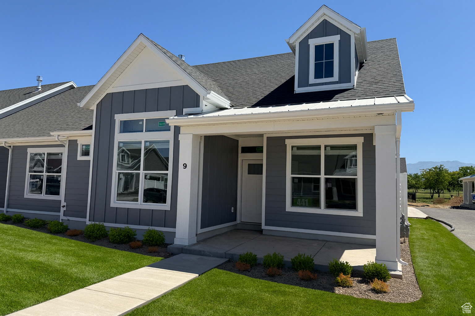 JUST completed modern farmhouse, designed for one-level living with 9-foot ceilings, huge windows and private patio. The open layout is ideal for entertaining. You'll find upgraded stainless steel appliances in the kitchen, a 5-burner gas range with convection oven & air fryer, upgraded cabinets adorned with sleek hardware, backsplash, and quartz countertops. The owner's suite includes a spacious bedroom, walk-in closet, large linen closet and dual vanity. Enjoy community amenities such as a Pickleball court, along with hassle-free living, including yard care and snow removal. Rest assured, with builder and system warranties included. AMAZING incentives with our preferred lenders towards interest rate buy down/closing costs!! Come see this beautiful home!!