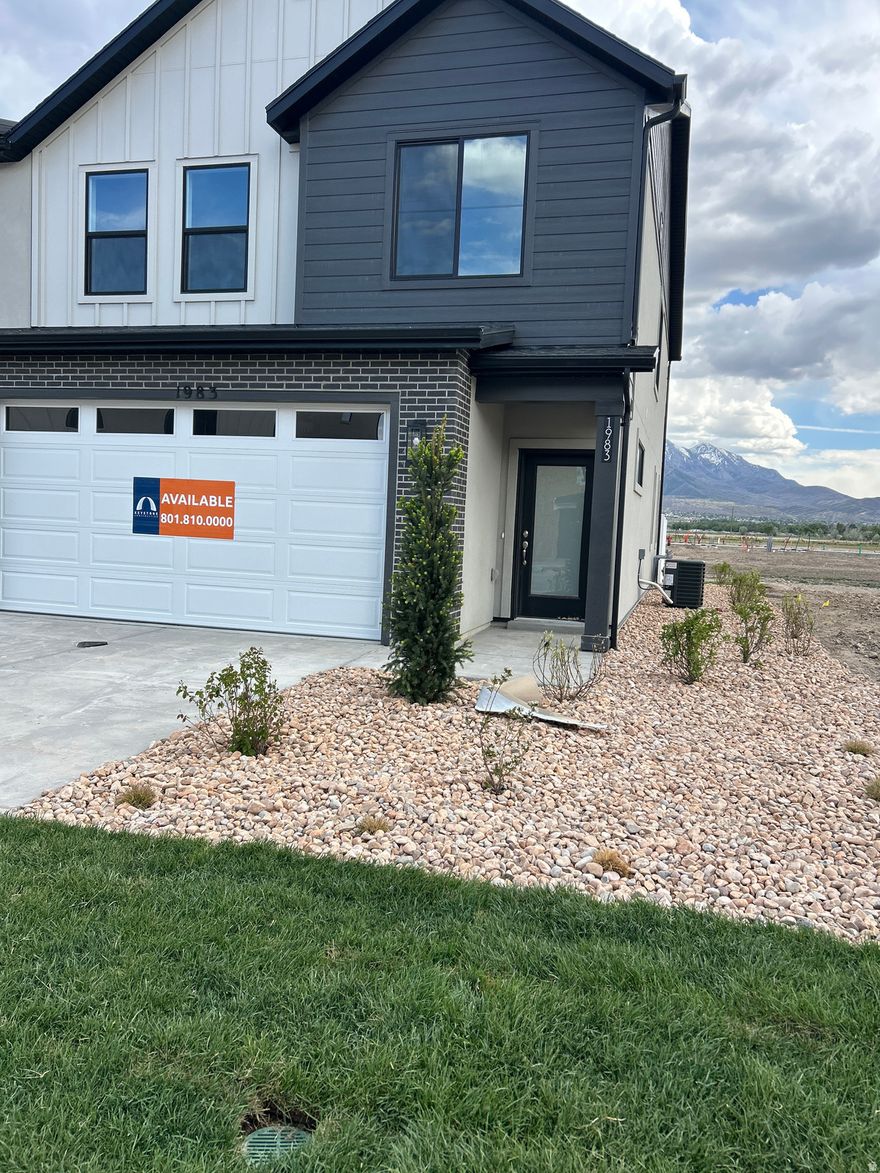 Available now! End unit Alder plan in our brand new Hiatt Creek Community in Payson. Back yard is fenced in w/a privacy fence and is landscaped with a private patio. 3 beds/2.5 baths and a spacious loft! Owner's suite is spacious w/a dual vanity and walk-in closet w/organizers. Dramatic "open-to-below" w / large picture windows lets in ample lighting throughout home. 2 spacious secondary bedrooms. Main level kitchen has a large island, walk-in pantry and ample cabinetry and countertop space.  25' driveway and a 2-car garage allows for plenty of parking. Interior selections have been made by our professional designer and they are gorgeous! Cabinetry is soft, earth-tones with light colored flooring and Quartz countertops. Large, picture windows throughout home allow plenty of light in this beautiful, cozy home. Builder incentive is $11,500 and can go toward the purchase price or closing costs or both and is not tied to using a preferred lender.
