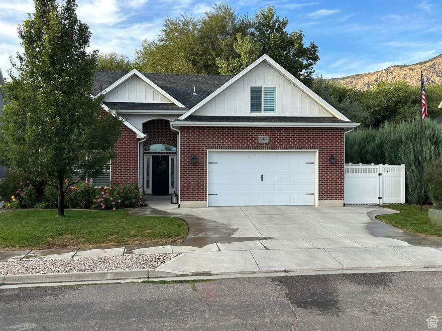 Very stunning North Ogden home. Very secluded backyard with a stream running through it. Large patio, 2 storage sheds, large master bedroom on the main floor, and a gas fireplace.