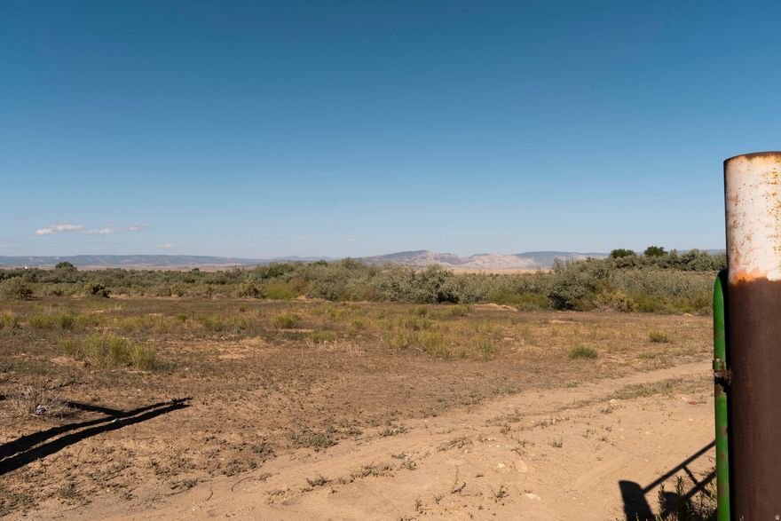 93 acres of opportunity with wide-open potential. Previously zoned for mobile home housing and agricultural use, the versatile property offers room to build, invest, farm, or develop. Endless possibilities in a peaceful setting. Buyer is to verify all listing information to buyers own satisfaction.