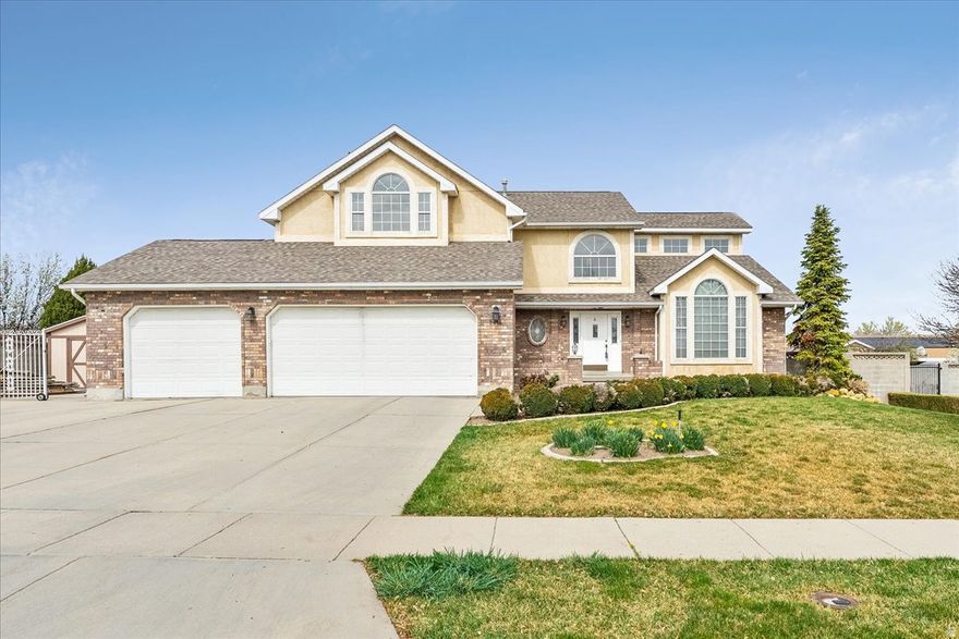 Have you ever seen such beauty? This gorgeous custom-built home in the heart of South Jordan, offering over 4,780 sq ft of thoughtfully designed living space. From the moment you walk in, you'll immediately feel how well this home has been cared for, pride of ownership truly shines throughout. *Seller is installing new deck to upper master bedroom. Located in a quiet and peaceful neighborhood, this property is perfectly located just minutes from Mountain View Golf Course, only 5 minutes to Bingham High School, and close to Salt Lake Community College, along with convenient access to grocery stores, dining, and everyday essentials. Step inside to find soaring ceilings and an open layout that creates a bright, inviting atmosphere. The spacious kitchen is perfect for entertaining, offering plenty of room to gather with friends and family. One of the standout features of this home is the luxurious primary suite, complete with your own private fireplace. The en-suite bathroom is truly one-of-a-kind! It features large windows for natural light, a stunning jetted tub, double sinks, and a design you simply won't find anywhere else in Utah. The seller is currently building a brand new deck that will be directly accessible from the primary bedroom, creating the perfect private indoor-outdoor retreat for the future homeowner. Downstairs, the fully finished basement includes a second kitchen, making it ideal for entertaining, hosting guests, or even creating a mother-in-law apartment with the potential to add a separate entrance. Outside, enjoy a spacious backyard, RV parking, and room to accommodate 10+ vehicles a rare and valuable feature. This home checks all the boxes: space, location, uniqueness, and functionality. Tour today and experience it for yourself!