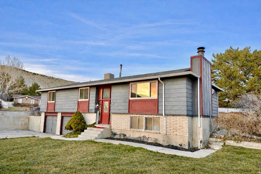 Set in a quiet, well-kept Price neighborhood where people actually know their neighbors, this home offers the kind of space and comfort that's hard to find. Major updates include a newer roof, updated appliances, and new flooring-so the big-ticket items are already handled. Upstairs features all new windows along with a new swamp cooler, keeping the home bright, efficient, and comfortable. With 5 bedrooms, 3 bathrooms, multiple living areas, a 2-car garage, and plenty of extra parking, there's room here for everyday life, guests, and everything in between. Close to schools and tucked away from traffic, this is the kind of home that feels right the moment you walk in.  Square footage figures are provided as a courtesy estimate only and were obtained from CubiCasa. No County Records Available.  Buyer is advised to obtain an independent measurement.