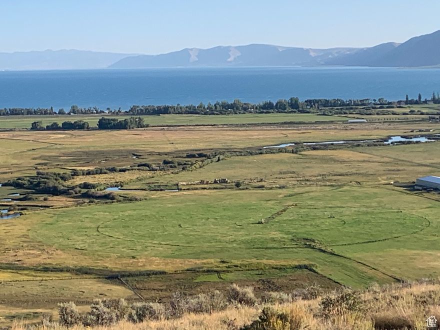 Absolutely stunning views of Bear Lake and Big Creek from this one acre lot in Laketown. Great spot to build your dream cabin. Access endless UTV and snowmobile trails minutes from your front door.....Cottonwood Canyon and Temple Flats. Rendezvous Beach and First Point close by for fun in the sun! NO HOA. Off gris.  Septic, wel, generator/solarl needed. Call agent for more information.