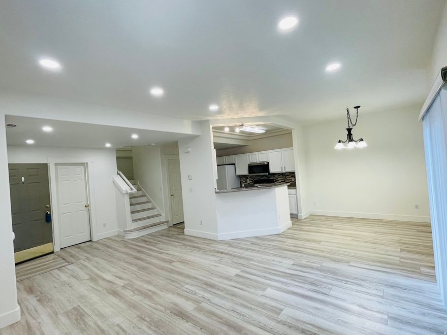 Discover the perfect combination of comfort and convenience in this exceptional condominium, ideally located in a coveted area. With stunning new flooring and elegant recessed ceiling lights, this spacious home is bathed in natural light, creating a warm and inviting atmosphere, perfect for relaxing or entertaining.  This property is an exceptional opportunity for first-time homebuyers or savvy investors looking to capitalize on the rental market. With 3 spacious bedrooms and 2.5 bathrooms, there is ample space for families or guests to recover.  The community offers access to a beautiful clubhouse that includes a well-equipped fitness center, a refreshing pool, and a relaxing spa. Plus, with water bills included, you'll enjoy a hassle-free living experience in a safe and welcoming neighborhood.  You'll love the convenience of being just 5 minutes from Mountain View Village, schools, parks, a movie theater, shopping, and Costco. Excellent connectivity to the Mountain View Corridor and Bangor Parkway ensures that everything you need is within easy reach. This is more than just a home; It's a lifestyle waiting for you to embrace! Don't miss out on this incredible opportunity!