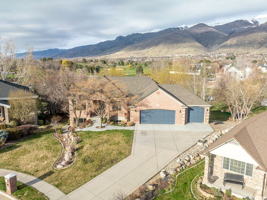 How many 1-acre properties in Kaysville sit in a cul-de-sac, feature a private pond and stream, and still offer wide-open space? Very few-come experience this one for yourself.  This exceptional home offers six bedrooms and four bathrooms with a thoughtful, functional layout throughout. The kitchen is designed for both everyday living and entertaining, featuring double ovens, a gas range, and a spacious pantry. You'll love the generous walk-in closets and the large back deck overlooking a peaceful pond and waterfall-an ideal setting to relax or host while enjoying mature landscaping and serene surroundings.  The property also provides incredible flexibility with a fully functional 1,600 sq ft basement apartment, complete with its own kitchen, laundry, and fireplace-perfect for extended family, guests, or additional income. Car enthusiasts or hobbyists will appreciate the 3-car main garage plus a separate 2-car lower garage/workshop, along with a convenient basement entrance from the main garage. The wall between the apartment and the large family room can also be removed if a more open layout is preferred.    Additional features include dual furnaces and A/C units, with the roof replaced in 2011.  Ideally located near the heart of Kaysville with quick freeway access, this is a rare opportunity to own a truly unique property that checks all the boxes.  Easy to show-schedule your private tour today.