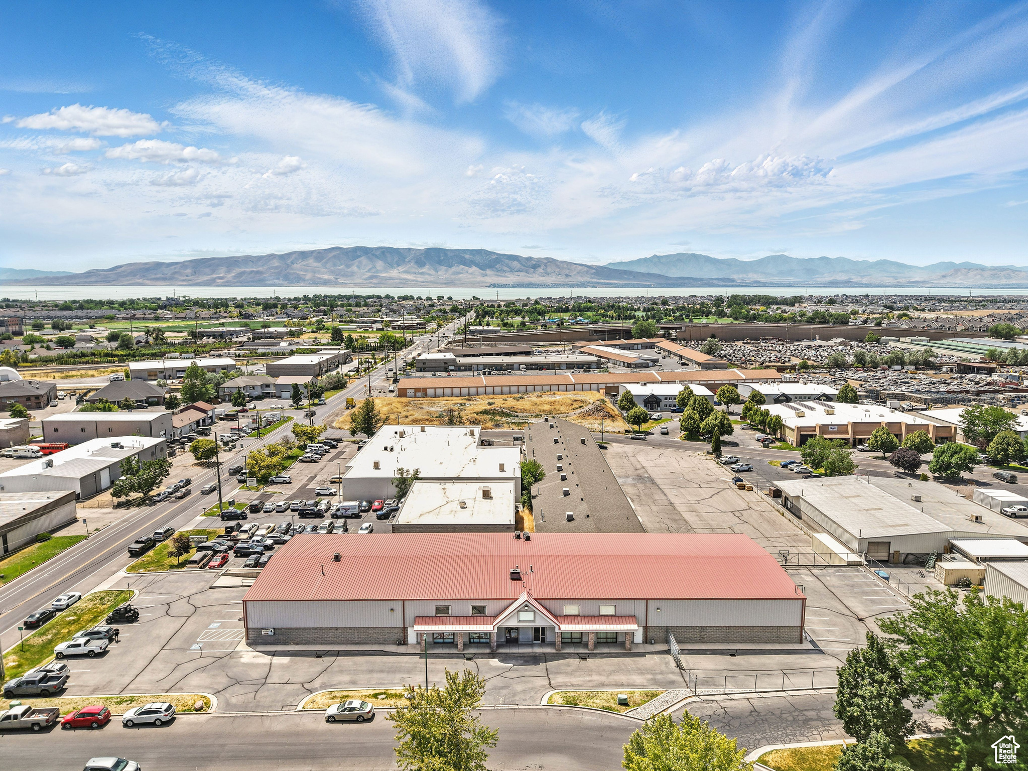 This is the south side unit of one single unit also listed for lease! Interested parties can lease this south half, the north half, or the the full warehouse which is 17,400 SF of total space with roughly 15,000sqft being warehouse space and 2,400sqft being office. This versatile facility features clear heights ranging from 16' to 20', one dock-high door and four ground-level doors for efficient loading, There are two electric panels (one for each side) that are 400W each, gas forced air heat (AC only in the office), and a gated parking lot on the north side for secure parking or yard needs. Zoned M-2, this property accommodates a wide range of manufacturing, distribution, and warehouse uses. Offered at $12/SF NNN ($17,400 a month), this is an excellent opportunity for businesses seeking quality industrial space with easy access to I-15 and major Utah County arteries. CAM Fees are 1.50/sqft each year.
