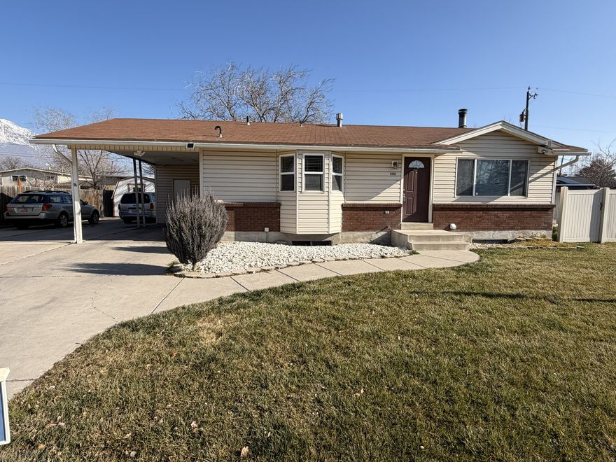 Spacious 6-bedroom Orem home with a fully finished basement apartment-perfect for multi-generational living or rental income! The main level offers an updated kitchen, family room, and 3 bedrooms, while the basement includes a private entrance, second kitchen, 3 bedrooms, and laundry. Enjoy a patio with mature walnut and apple trees, all just minutes from I-15, shopping, and dining.  Square footage provided as a courtesy estimate; buyer to verify.