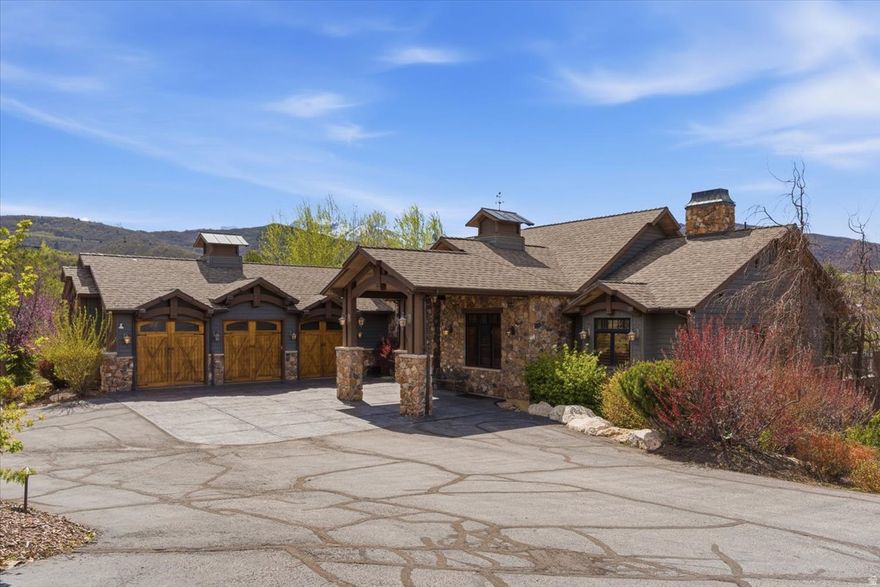 Step inside more than 8,300 square feet of mountain luxury, where scale, craftsmanship, and setting come together in a home designed to impress from the very first moment. Behind the gates of Summit at Ski Lake, this estate offers the kind of privacy, presence, and panoramic Ogden Valley views that define a true legacy property.  Expansive living spaces create a sense of openness throughout the home, with soaring ceilings, generous gathering areas, and large windows that frame Pineview Reservoir, the valley floor, and the surrounding mountain ridgelines. Every room feels connected to the landscape, creating a seamless balance between refined interiors and the natural beauty beyond.  The kitchen is built for both everyday living and elevated entertaining, with high-end appliances, abundant prep space, custom cabinetry, and a layout that invites guests to gather. Formal and informal living areas provide room for quiet mornings, holiday weekends, and full-house celebrations, while thoughtful architectural details give the home warmth and character at every turn.  The primary suite feels like its own private wing, offering space to unwind, recharge, and take in the mountain setting. Spa-inspired finishes, generous closet space, and private retreat areas create a calming escape within the home.  With multiple bedrooms, flexible living spaces, entertainment areas, and room for guests, this residence is designed for mountain living on a grander scale. Whether used as a full-time residence, second home, or multi-generational retreat, the property offers the space and versatility today's luxury buyers are seeking.  Located minutes from Snowbasin, Powder Mountain, Nordic Valley, and Pineview Reservoir, this Summit at Ski Lake estate places four-season recreation right outside your door. From ski mornings to summer lake days, this is a home built for gathering, retreating, and living the mountain lifestyle without compromise. All property information, boundaries and documents to be verified by buyer.